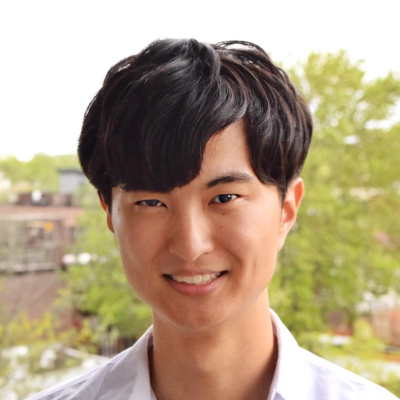 man wearing white shirt in outdoor setting